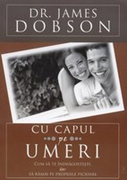 Cu capul pe umeri
