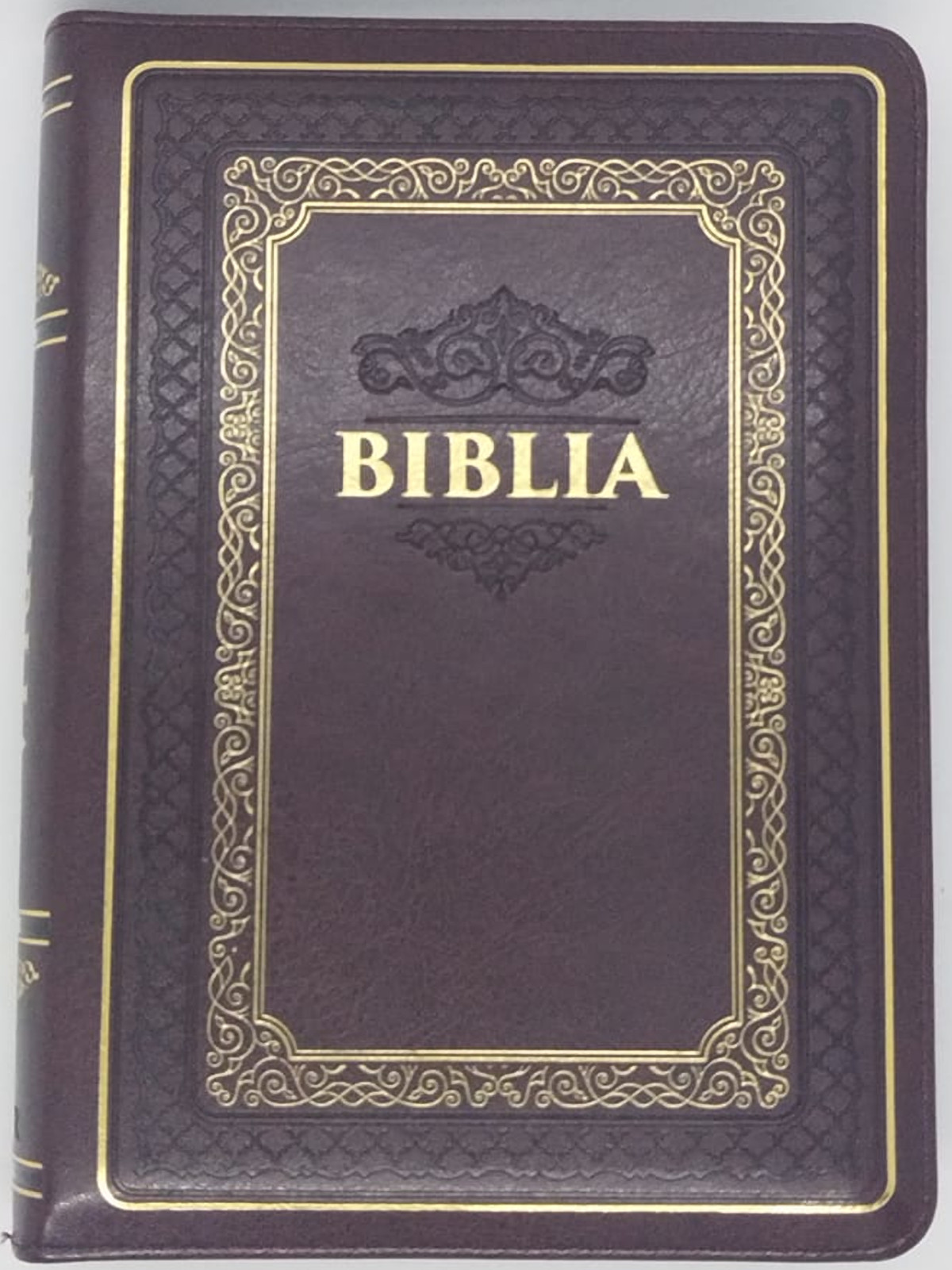 Biblie, medie, maro-visiniu, cu chenar decorativ, margini aurii, index, fermoar